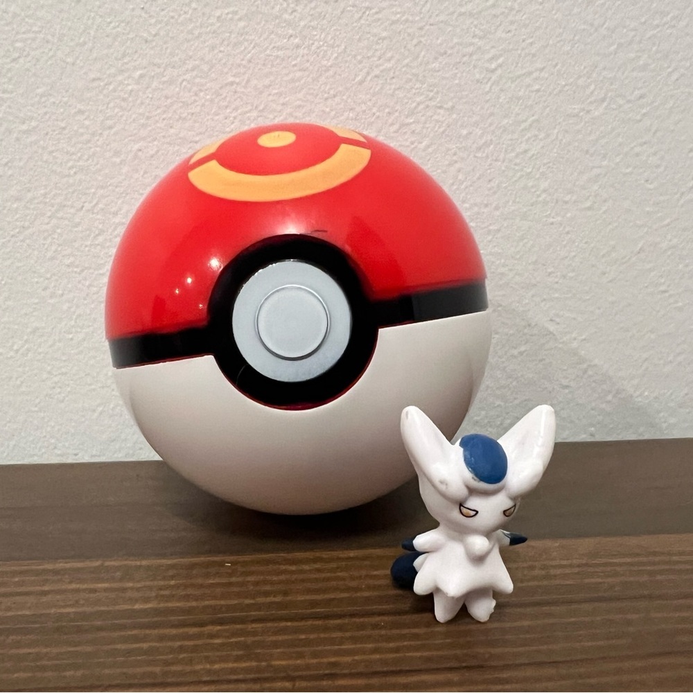 Pokeball and Pokemon Figure